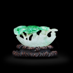 Qing Dynasty Jadeite carving of a boy rowing a boat