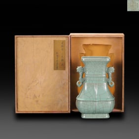 Southern Song Dynasty Guan kiln celadon-glazed double lion-ear vase, inscribed with Qianlong