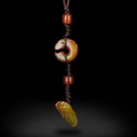 Cultural Period to Han Dynasty A set of jade jue and jade cicada