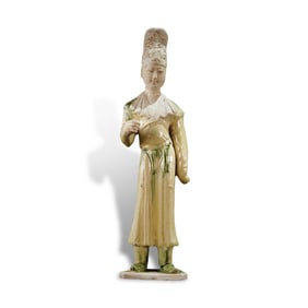 Tang Dynasty Tri-color male figurine with white glaze