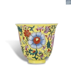 Qing Dynasty Qianlong period Cup with foreign-style polychrome floral motifs on a yellow ground