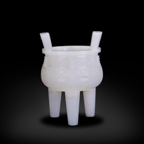 Ming Dynasty Hetian white jade tripod with beast face patterns