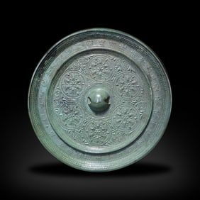 Tang Dynasty Bronze mirror with treasure flower patterns and inscriptions