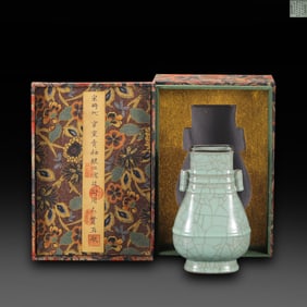 Song Dynasty Guan kiln celadon-glazed vase with twin through ears, inscribed with Qianlong Emperor's