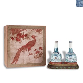 Qing Dynasty Qianlong period, A pair of doucai long-necked vases with interlocking flower patterns