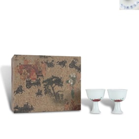 Kangxi period, Qing Dynasty: A pair of underglaze red and five-color stem cups with flower patterns