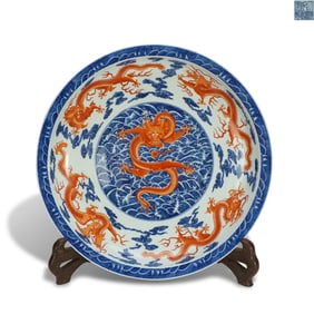 Qing Dynasty Qianlong period, Large blue-and-white plate with alum-red, sea wave and nine-dragon