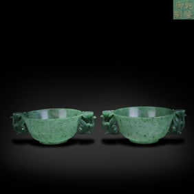 Qing Dynasty Qianlong period, A pair of imperial-made Hetian jasper bowls with floral patterns