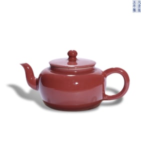 Yongzheng period Qing Dynasty Imperial ruby-red glaze pot with orb-shaped knob lid and recumbent