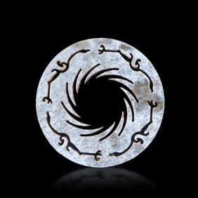 Shang Dynasty jade bi with the pattern of the Sun God Bird
