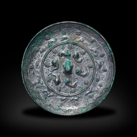 Tang Dynasty Bronze mirror with sea beast and grape patterns