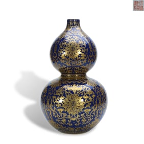 Qing Qianlong period a Ji blue glaze gourd-shaped bottle with gold-painted characters of "Both