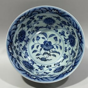 MING DYNASTY BLUE AND WHITE PORCELAIN BOWL WITH LOTUS AND DRAGON DESIGN