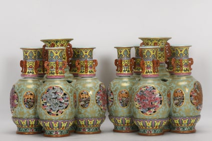 A PAIR OF QING DYNASTY ENAMEL DRAGON-PATTERNED REVOLVING VASES