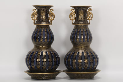 A PAIR OF BLUE-GLAZED GOURD-SHAPED VASES WITH THE CHARACTER "LONGEVITY" FROM THE QING DYNASTY