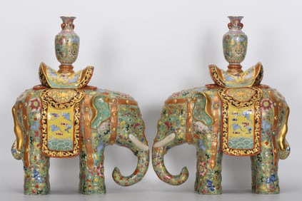 A PAIR OF QING DYNASTY ENAMEL ELEPHANTS