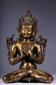 A QING DYNASTY GILT BRONZE TARA BUDDHA STATUE INLAID WITH TURQUOISE.