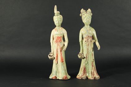 A PAIR OF CELADON FIGURES FROM THE TANG DYNASTY