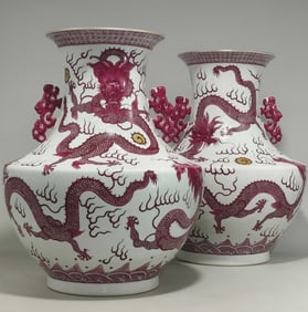 A PAIR OF QING DYNASTY ROUGE-RED DRAGON-PATTERNED VASES