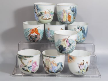A SET OF QING DYNASTY FAMILLE ROSE EIGHTEEN ARHAT CUPS