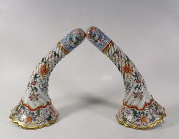 A PAIR OF QING DYNASTY FAMILLE ROSE LANDSCAPE AND PAVILION FLOWER VASES