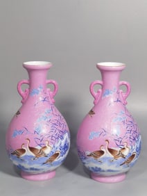 A PAIR OF QING DYNASTY ENAMEL-PAINTED VASES WITH REED AND WILD GOOSE DESIGNS AND DOUBLE HANDLES