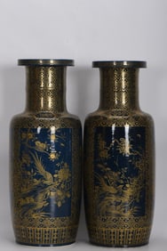 A PAIR OF QING DYNASTY CELADON-GLAZED, GOLD-PAINTED, OPENWORK FLORAL AND BIRD VASES