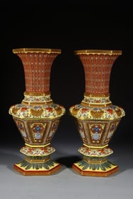 A PAIR OF YELLOW HEXAGONAL FLOWER VASES FROM THE QING DYNASTY