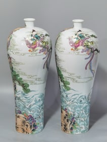 A PAIR OF QING DYNASTY ENAMEL-PAINTED PLUM VASES DEPICTING FIGURES