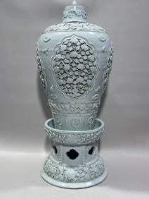 YUAN DYNASTY CARVED PORCELAIN PLUM VASE