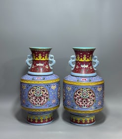 A PAIR OF QING DYNASTY ENAMEL REVOLVING VASES