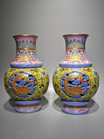 A PAIR OF QING DYNASTY ENAMEL REVOLVING VASES