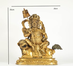GILT BRONZE TREASURE KING FROM THE QING DYNASTY