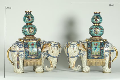 A PAIR OF QING DYNASTY CLOISONNE ELEPHANTS