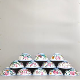 A SET OF TWELVE FLOWER GODDESS ENAMEL BOWLS FROM THE QING DYNASTY