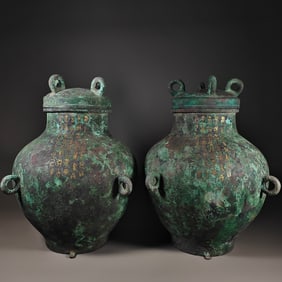 A PAIR OF WARRING STATES PERIOD GOLD AND SILVER INLAID VASES