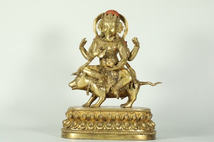 GILDED ELEPHANT-TRUNKED GOD OF WEALTH FROM THE MING DYNASTY