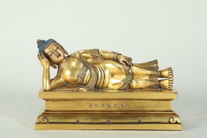PLEASE PROVIDE A GILDED RECLINING SHAKYAMUNI BUDDHA STATUE.