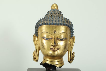GILDED BUDDHA HEAD FROM THE MING DYNASTY