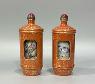A PAIR OF QING DYNASTY FAMILLE ROSE REVOLVING SNUFF BOTTLES