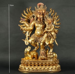 GILDED ELEPHANT-TRUNKED GOD OF WEALTH FROM THE MING DYNASTY