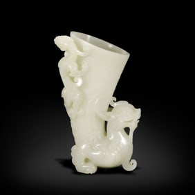Qing Dynasty Hetian white jade horn-shaped cup with chi-dragon patterns