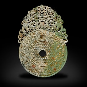 Han Dynasty Jade bi with "Chang Le" and dragon patterns, with protruding edges