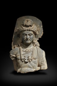 A Gandhara-style stone-carved Buddha bust