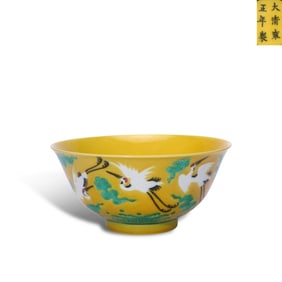 Qing Dynasty Yongzheng period, Yellow-ground green-enameled bowl with sea wave and white crane