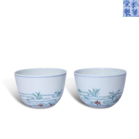 Qing Dynasty Qianlong period, A pair of Doucai saucer bowls with "falling flowers over flowing