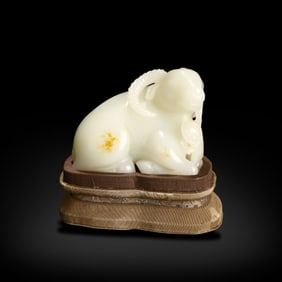 Qing Dynasty Hetian white jade ornament carved as a sheep holding ganoderma