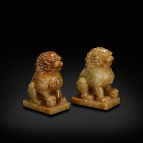 Ming Dynasty or earlier A pair of jade lions