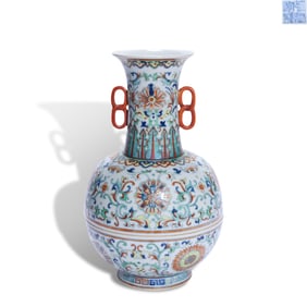 Qianlong period Qing Dynasty Doucai covered vase with scrolling flower patterns