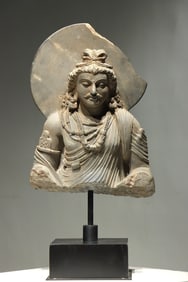 A Gandhara-style stone-carved Buddha bust